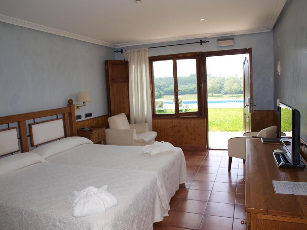 Hotel Don Silvio Colombres Pokoj fotografie